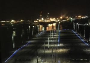 Conference dinner view of the life-size outlines of the Titanic and Olympic main deck’s, illuminated by blue light