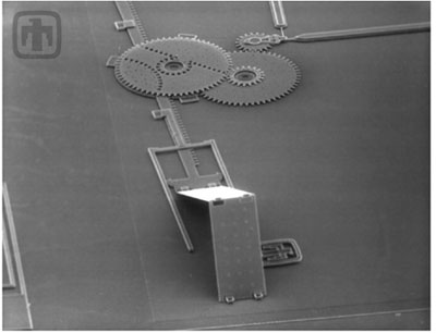 SEM image of pop-up mirror with part of the gear drive assembly